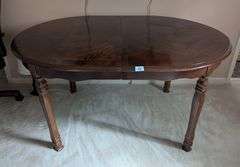 Oval table, 55"x40"x29"tall, (2) leaves 12” (located in upstairs bedroom)