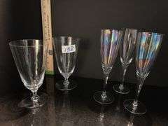 Pair of ice tea goblets and set of 3 champagne flutes (located in dining room)