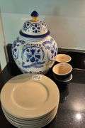 Vintage ginger jar, set of 8 small plates, set of 4 ramekins (located in kitchen)