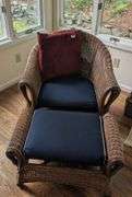 Wicker armchair,32" tall, 29" wide with matching ottoman, 30"x19"x19"(sunroom)