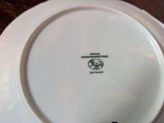 16 pc. Lorenz Hutschenreuther plates, made in Germany, with 3 storage bags(located in dining room)st