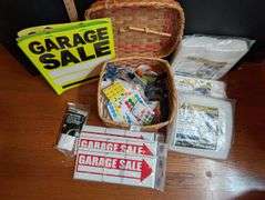 Garage sale basket with supplies(located in front bedroom)