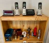 2 Shelf Lot of Phones, Flashlights and More (Located in Bedroom to The Right)