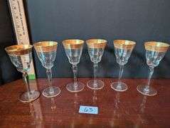 6 pc. Vintage gold rimmed wine glasses(located in dining room)