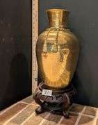 Vintage brass vase handmade in India with wood stand(located in family room)