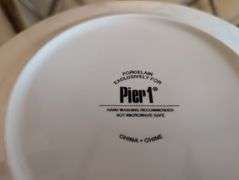 Basket of Pier 1 holiday plate and twisted peppermint lotion, shower gel, fragrance and more(ds back