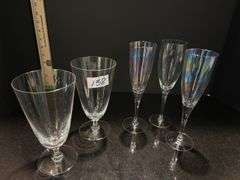 Pair of ice tea goblets and set of 3 champagne flutes (located in dining room)