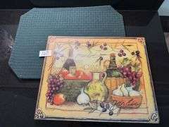 Set of 4 hunter green placemats, glass decorative trivet, pizza pan and cutter (located in kitchen)