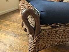 Wicker armchair,32" tall, 29" wide with matching ottoman, 30"x19"x19"(sunroom)