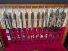 74 pc. Tutor Plate Oneida Community flatware with case(located in dining room)