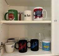 2 Shelf Lot of Cups (Located in Kitchen)
