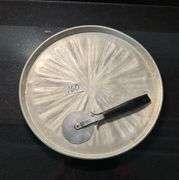 Set of 4 hunter green placemats, glass decorative trivet, pizza pan and cutter (located in kitchen)