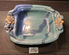 Palms up pottery dish, large ramekin, pair of square trays (located in kitchen)