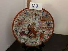 Japanese tea cup and saucer, tea pot, candlesticks and more (located in dining room)