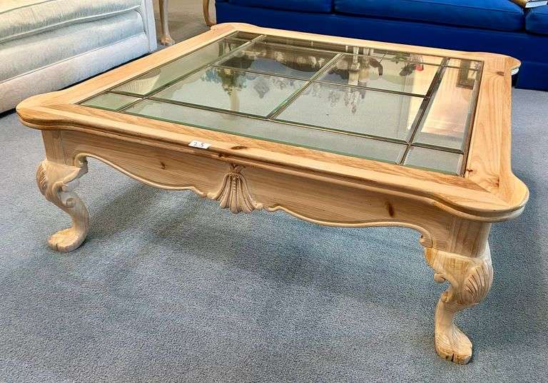 Glass Top Carved Coffee Table 15”x44 3/4” (Located in Living Room)