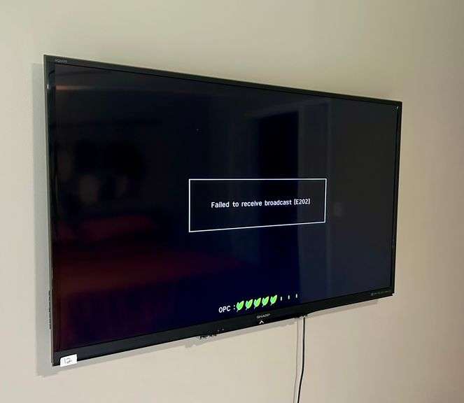 60” Sharp TV with Wall Mount (Bring Tools to Remove) (Located Upstairs Bedroom to the Left)