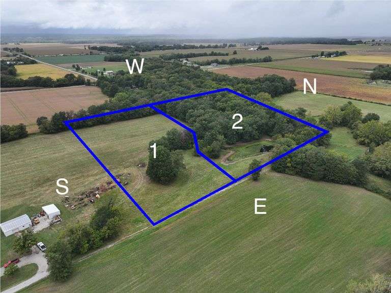 Tract 2• 5 + or – Surveyed Acres, north tract, Ideal Building Sites with sites for walkout basements in the woods! Mostly wooded w/large trees, possibly logging potential! 4/10’s of an acre pond with Bass, Bluegill and Catfish, Located in Sec 30 Watson Township, Section 30 Effingham County, IL