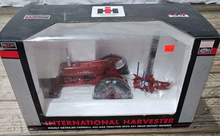 SpecCast International Harvester Farmall 400 gas with #31 mower, 1/16 scale diecast replica.
