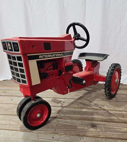 International metal pedal tractor