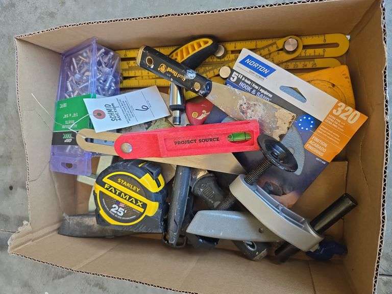 Tape measure, puddy knife, rivets, knife, misc.