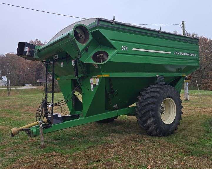 J&M 875 Grain Cart, Roll Tarp, 18'' Auger, Big 1000pto, has scales and scale head, scales need recalibrated, rear camera and spout camera, and camera monitor, Hyd. Adjustable Spout, s/n- 3828,