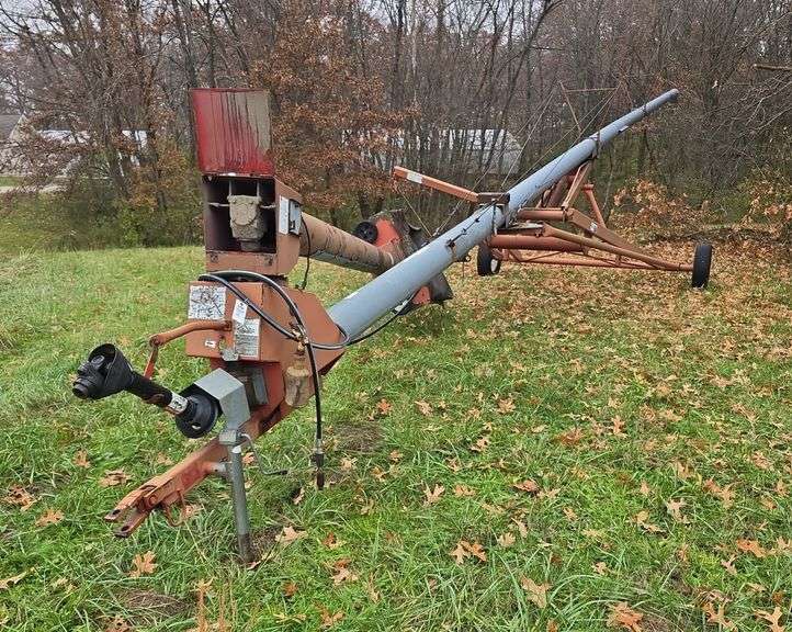 Hutchinson 8x61 swing away auger, has had a few holes patched up, still very usable