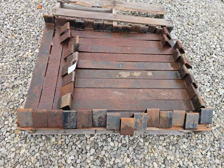 Assortment of steel coil racks for hauling coils