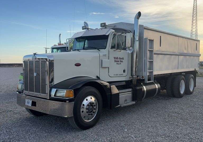 1995 Peterbilt Grain Truck, 10 Speed, 500hp, 6NZ Cat, 1,145,735 miles, plenty of power, Tandem Axle, Twin Screw, Roll Tarp, 20ft bed, Grain Chute and Rear Tailgate, Air Tail Gate, Legacy Seat, 11R24.5 Tires, VIN- 1XPCDB8X25D365692