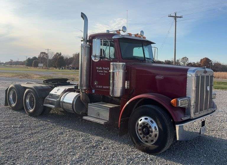 2001 Peterbilt 379 Day Cab Semi, C-15, 6NZ, Over 1 million miles, Dump trailer and feed trailer wet kit, 10 speed, 160,000 miles on Platinum Overhaul done at I-70 in Effingham, 213'' wheel base, sliding 5th wheel, 163 gallon fuel tank, air ride seat, Heat/AC, side step tool box, 295/75R22.5 Tires, VIN- 1XP5DB9X21D563419