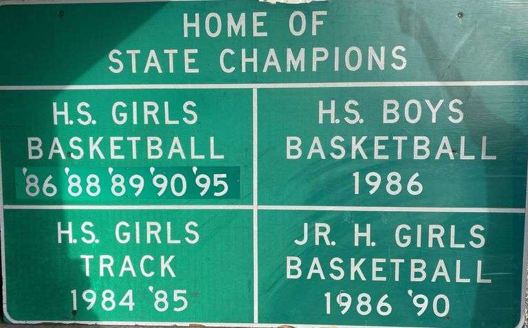 Teutopolis Home of the Champions Street Sign