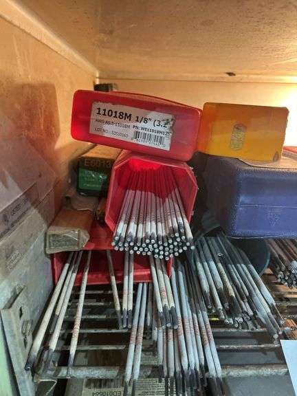 Shelf full of welding rods, 6011, 7018, 6013,