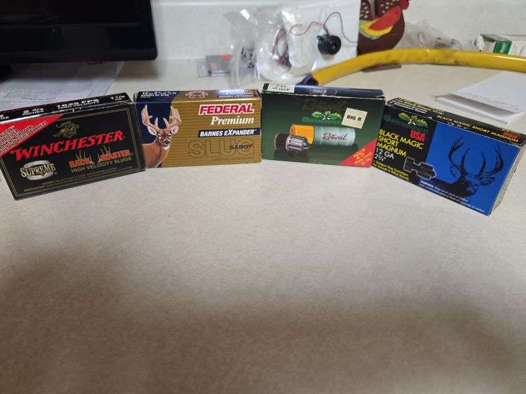 4 partial boxes of 12ga slugs, Winchester, black magic short magnum ...