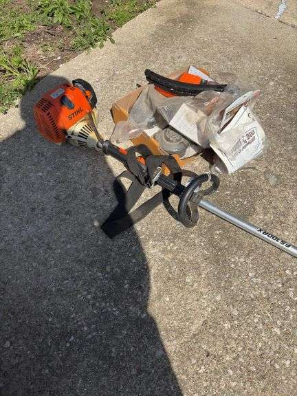Stihl FS100RX weed eater with guard and string. - Schmid Auction