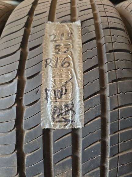 2 Michelin 215/65R16 tires no rims. - Schmid Auction