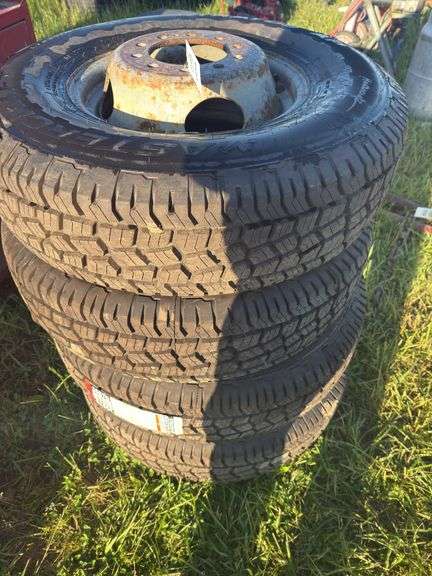 3 LT 235/85R16 tires with rims - Schmid Auction