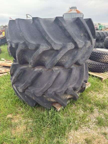 Pair of Firestone 28L-26 Rice Tires on Rim