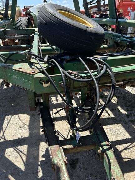 John Deere 335 30ft verticle tillage disk.