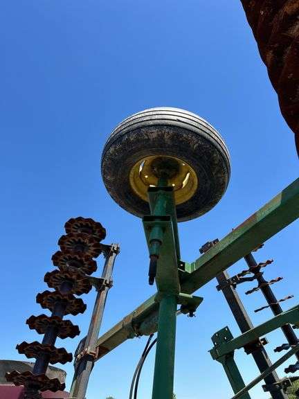 John Deere 335 30ft verticle tillage disk.