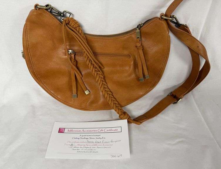 Millenium Shopping Spree donated by Millenium Women's Boutique & Jane Herman