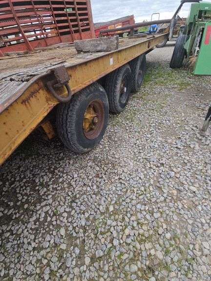 1985 tri-axel trailer 20' w/ramps used for hauling backhoe. VIN# 1S9FT9203FK061789