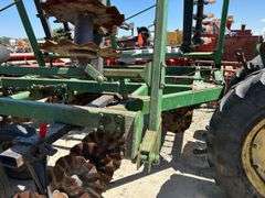 John Deere 335 30ft verticle tillage disk.
