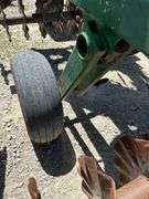 John Deere 335 30ft verticle tillage disk.