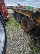 1985 tri-axel trailer 20' w/ramps used for hauling backhoe. VIN# 1S9FT9203FK061789