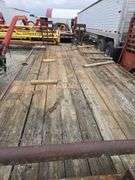 1985 tri-axel trailer 20' w/ramps used for hauling backhoe. VIN# 1S9FT9203FK061789