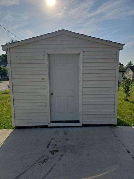 Portable shed 12'3"x10'3" 9' tall, 36"x80" door, on runners, buyers must remove