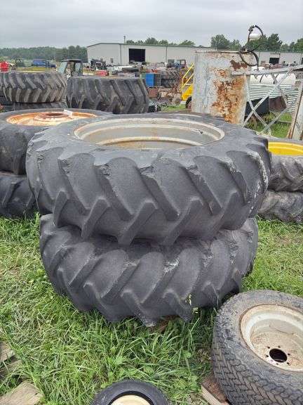Pair of B.F. Firestone 18.4-38 clamp on dual/rims