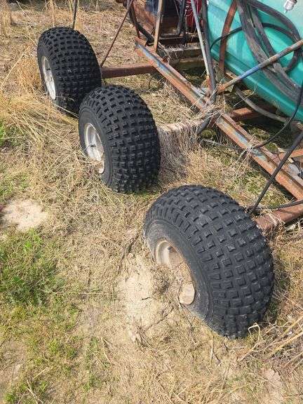 Triple Axel sprayer, pull type.