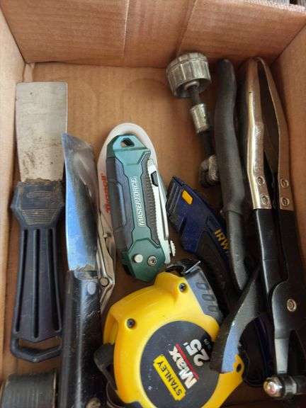 Filter Wrench, tape measure, Exacto knives, and misc