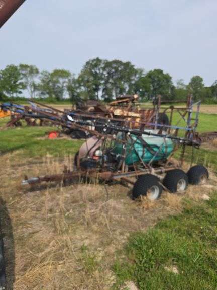 Triple Axel sprayer, pull type.