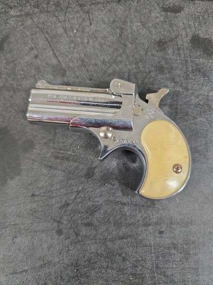 Davis Industries Model D-22 Derringer with case, 22 Caliber, gun smith special